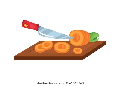 knife cutting carrot in kirchen board