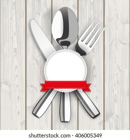 Knife, fork, spoon and emblem on the wooden background. Eps 10 vector file.
