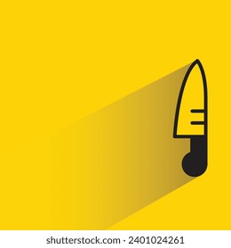 icono de cuchillo con sombra sobre fondo amarillo