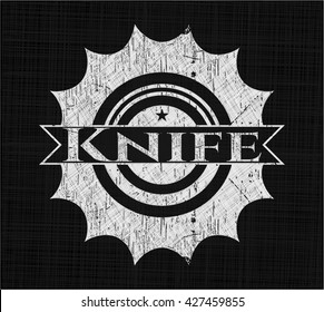 Knife written on a blackboard