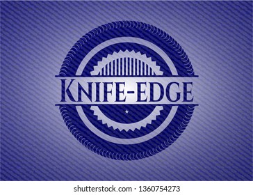 Knife-edge emblem with jean texture