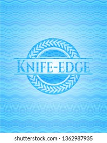 Knife-edge sky blue water style emblem.