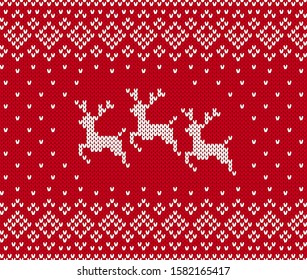 Knit christmas pattern with reindeer. Xmas seamless background. Vector. Knitted sweater print. Holiday winter red texture. Festive traditional ornament. Wool scandinavian pullover illustration.