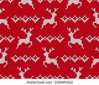 Knit christmas pattern. Xmas seamless background with deer. Vector. Knitted sweater print. Festive winter red texture. Holiday traditional ornament. Wool scandinavian pullover illustration.