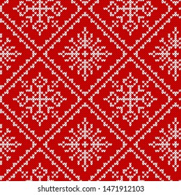 Knit seamless pattern. Christmas red texture. Vector. Knitted sweater background with snowflakes. Festive xmas winter print . Holiday fair traditional ornament. Wool pullover illustration.