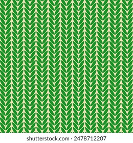 Knit seamless pattern in green color.Repeat pattern with leaf isolated on beige background.Christmas vector graphic wallpaper.