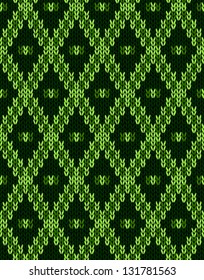 Knit woolen seamless jacquard ornament texture. Fabric Green color tracery background