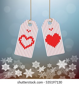 Knits Tag with hearts on a snowy background. Valentine's Day.