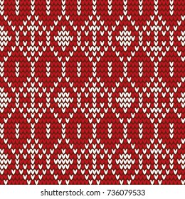 Knitted abstract red white geometric pattern. For decoration, design, knitting.