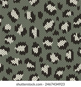 Knitted animal skin seamless pattern. Fabric imitation vector background. Flat style knit wallpaper with leopard print. Cute design for gift wrap, paper, textile