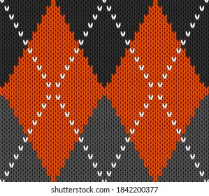 Knitted argyle Halloween pattern. Wool knitinng. Scottish plaid in orange, black and grey rhombuses. Traditional  Scottish background of diamonds . Seamless fabric texture. Vector illustration