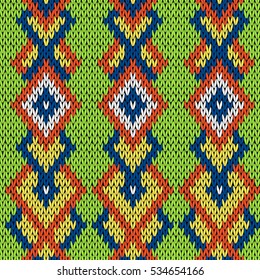 Knitted background in green, blue, orange, yellow and white colors, seamless knitting vector pattern as a fabric texture