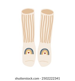 Knitted beige socks with cute rainbows. Vector isolated illustration.