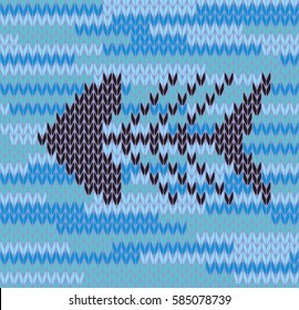 Knitted blue  background with a skeleton fish. Seamless pattern.