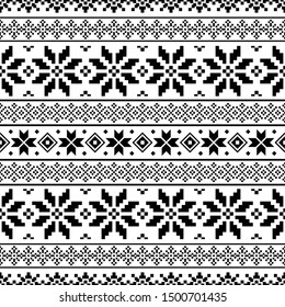 Knitted Christmas Ethnic pattern on white background. Ornament. Border. Seamless sample. It can be used as a background. Vector illustration.