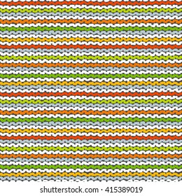 Knitted colorful seamless texture. A vector.