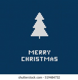 Knitted dark blue Merry Christmas greeting card with Christmas tree