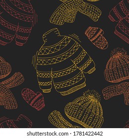 knitted doodle sweaters, scarves and hats of autumn red, yellow and orange colors on a dark background in doodle style, vector seamless pattern