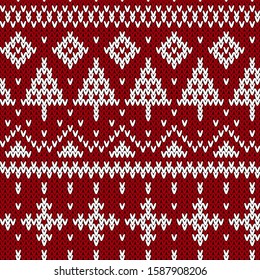 Knitted fabric with jacquard pattern: diamonds, Christmas trees, snowflakes. Seamless, vector, winter pattern