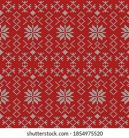 Knitted fancy pattern with old Slavic elements, white pattern on a red background. Vector illustration of ethnic seamless ornamental geometric pattern, for design and decoration