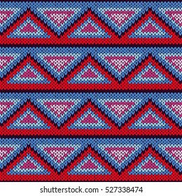 Knitted geometric background with colourful triangle ornament in red, blue, pink and magenta hues, seamless knitting vector pattern as a fabric texture
