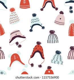 Knitted hats seamless pattern in vector. Christmas illustration