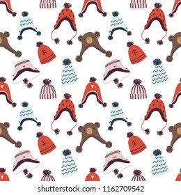 Knitted hats seamless pattern in vector. Christmas illustration