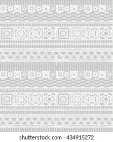 Knitted lace, lace pattern crochet, macrame. Floral seamless pattern with a fringe border knitted or woven macrame in boho style, chevron