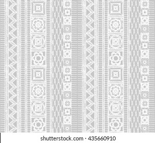 Knitted lace, lace pattern crochet, macrame. Floral seamless pattern with a fringe border knitted or woven macrame in boho style, chevron