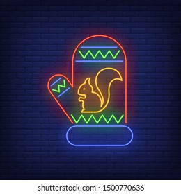 Knitted mitten with squirrel neon sign. Winter season, Christmas, frost design. Night bright neon sign, colorful billboard, light banner. Vector illustration in neon style.