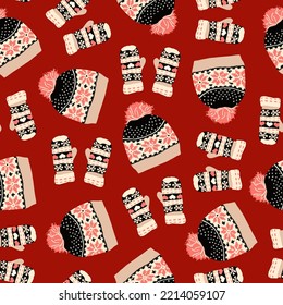 Knitted mittens and hats. Winter time. Seamless pattern. Textile, fabric, print. Red background. Ornaments and hearts. Love day. Cute things. 