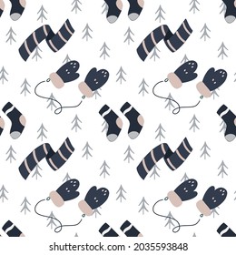 with knitted mittens, scarf and socks. Vector seamless pattern