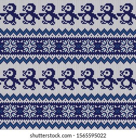 Knitted nordic vector seamless decorative pattern penguins
