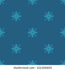 Knitted Norwegian snowflakes. Seamless vector background. Folk motives. Winter pattern. Can be used for wallpaper, textile, invitation card, wrapping, web page background.