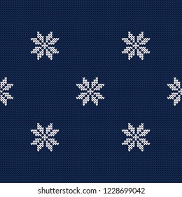 Knitted Norwegian snowflakes. Seamless vector background. Folk motives. Winter pattern. Can be used for wallpaper, textile, invitation card, wrapping, web page background.