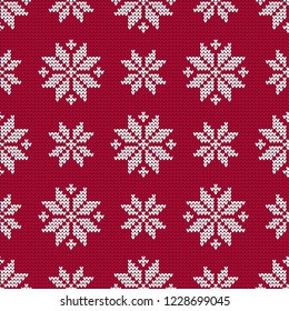 Knitted Norwegian snowflakes. Seamless vector background. Folk motives. Winter pattern. Can be used for wallpaper, textile, invitation card, wrapping, web page background.