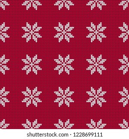 Knitted Norwegian snowflakes. Seamless vector background. Folk motives. Winter pattern. Can be used for wallpaper, textile, invitation card, wrapping, web page background.