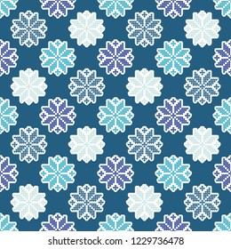 Knitted Norwegian snowflakes. Seamless vector background. Folk motives. Winter pattern. Can be used for wallpaper, textile, invitation card, wrapping, web page background.