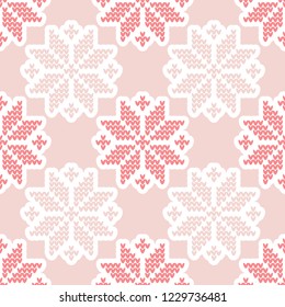 Knitted Norwegian snowflakes. Seamless vector background. Folk motives. Winter pattern. Can be used for wallpaper, textile, invitation card, wrapping, web page background.
