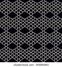 Knitted openwork lace mesh. Seamless vector pattern.
