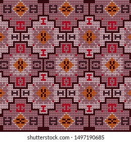 Knitted oriental carpet. Seamless pattern. Elements of ancient weaving. Looks nice on knitted clothes.