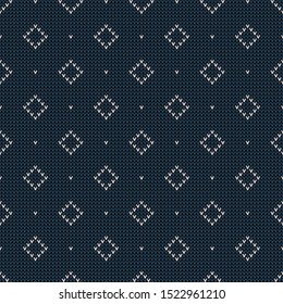 Knitted pattern in blue and grey with decorative rhombus ornament. Knit texture for everyday winter dress, socks, scarf, or other casual textile design.