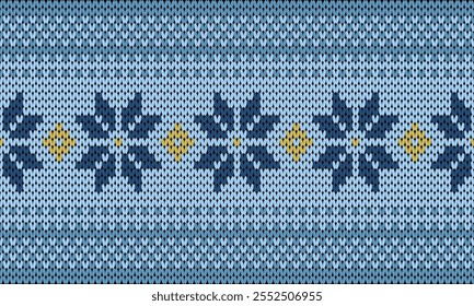 The knitted pattern features symmetrical floral designs with dark blue petals and yellow centers, set against a light blue background, resembling traditional Scandinavian or winter-inspired motifs.