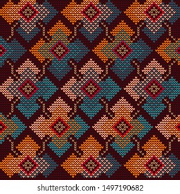Knitted pattern in the form of squares and chains. Knitting pattern. Suitable for sweaters, scarves and hats. Yellow-blue ornament on a dark background.