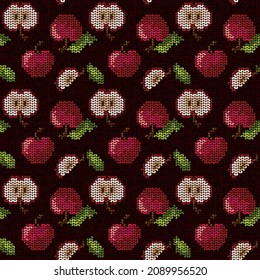 Knitted pattern with red apples, apple slice and leaves on a dark background. Seamless vector pattern. Vector illustration for use with textiles, backgrounds, children's items, postcards.