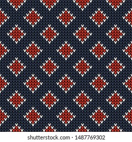 Knitted pattern. Seamless knit texture with rhombuses in dark blue, bright red, and white for socks, scarf, top, dress, or other modern textile design.