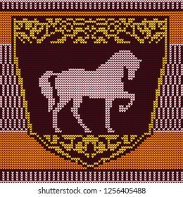 Knitted pattern silhouette of a horse in a curly frame with a floral pattern.