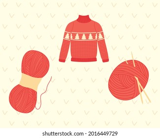 Knitted pullover with yarn and needles on white background