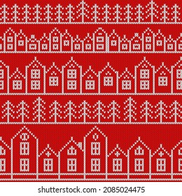 Knitted red Christmas background. Houses and christmas trees seamless pattern. Texture for fabric, wrapping, wallpaper. Decorative print.