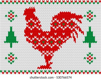 Knitted Red Rooster. Symbol of the New Year 2017. 